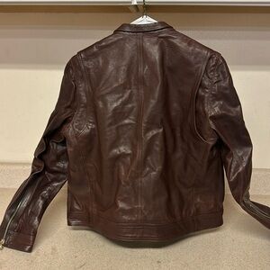 Woman’s size 12 leather Coach jacket brown